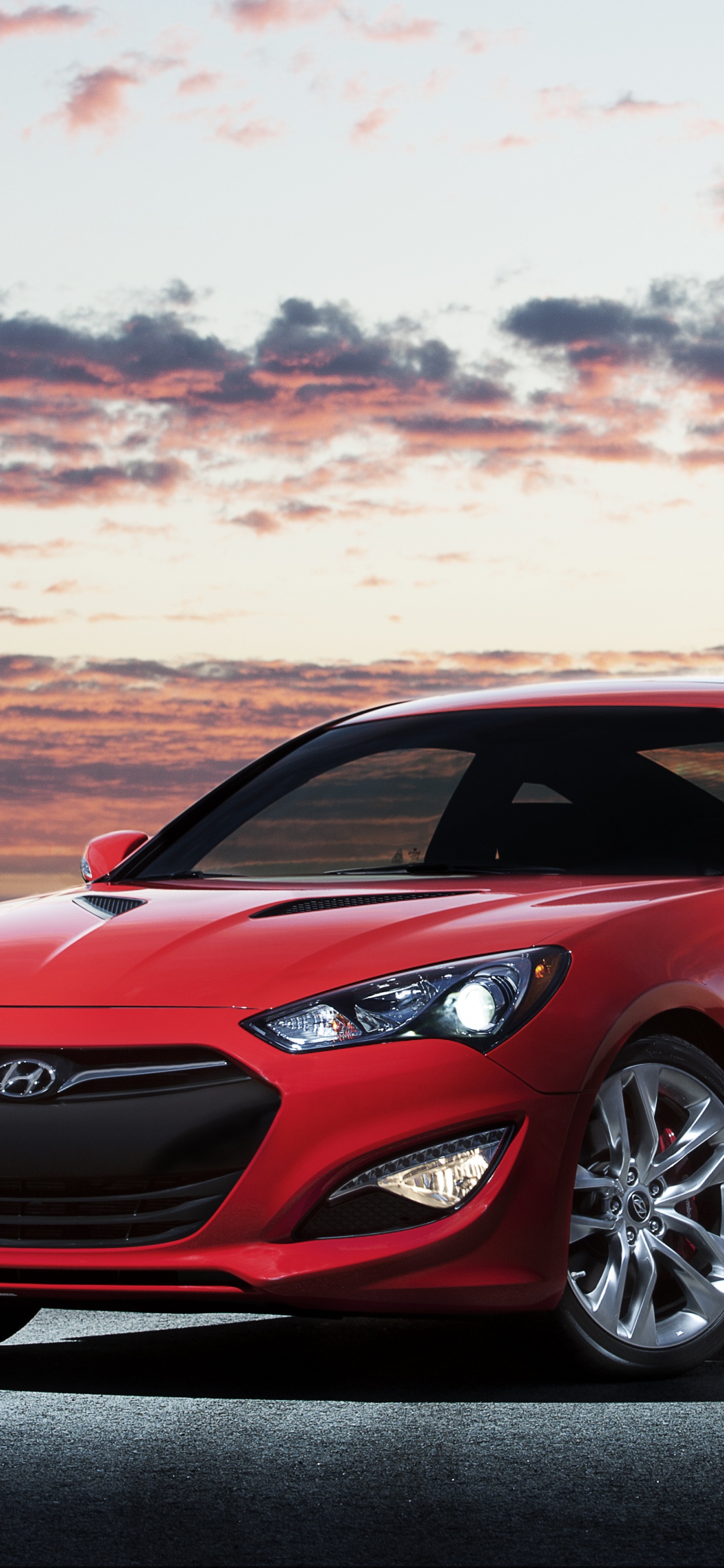 Red Porsche 911 on Gray Asphalt Road During Daytime. Wallpaper in 1242x2688 Resolution