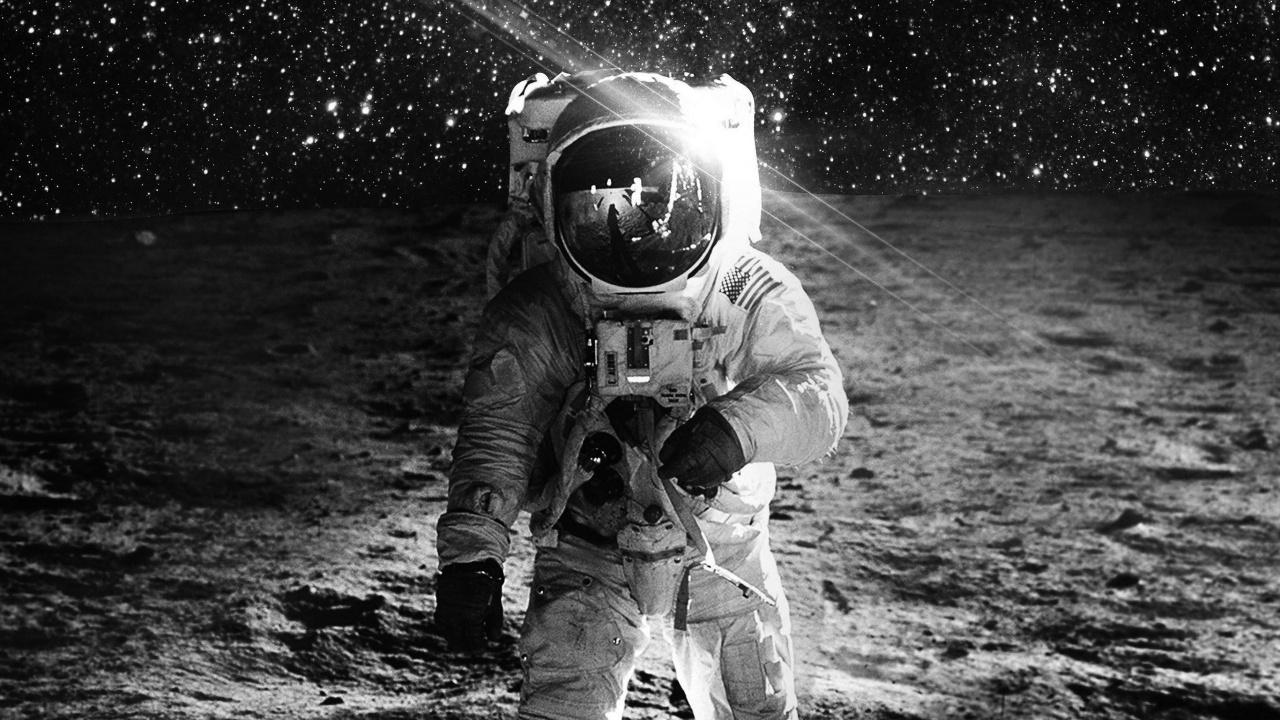 Grayscale Photo of Man in White Jacket and Pants Wearing Goggles. Wallpaper in 1280x720 Resolution