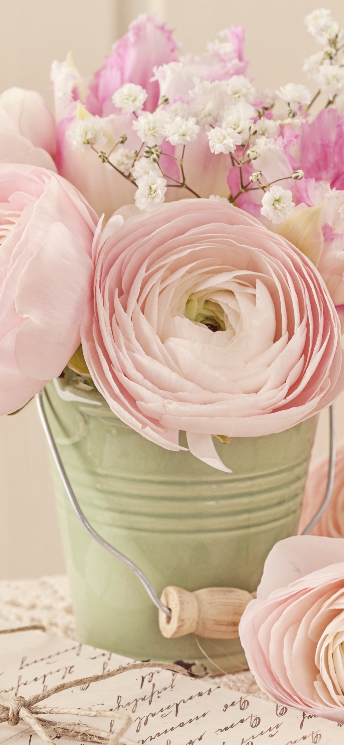 Pink Roses in Green Ceramic Vase. Wallpaper in 1125x2436 Resolution