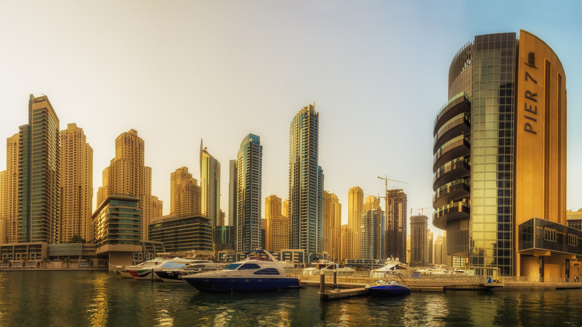 White and Blue Boat on Body of Water Near City Buildings During Daytime. Wallpaper in 1920x1080 Resolution