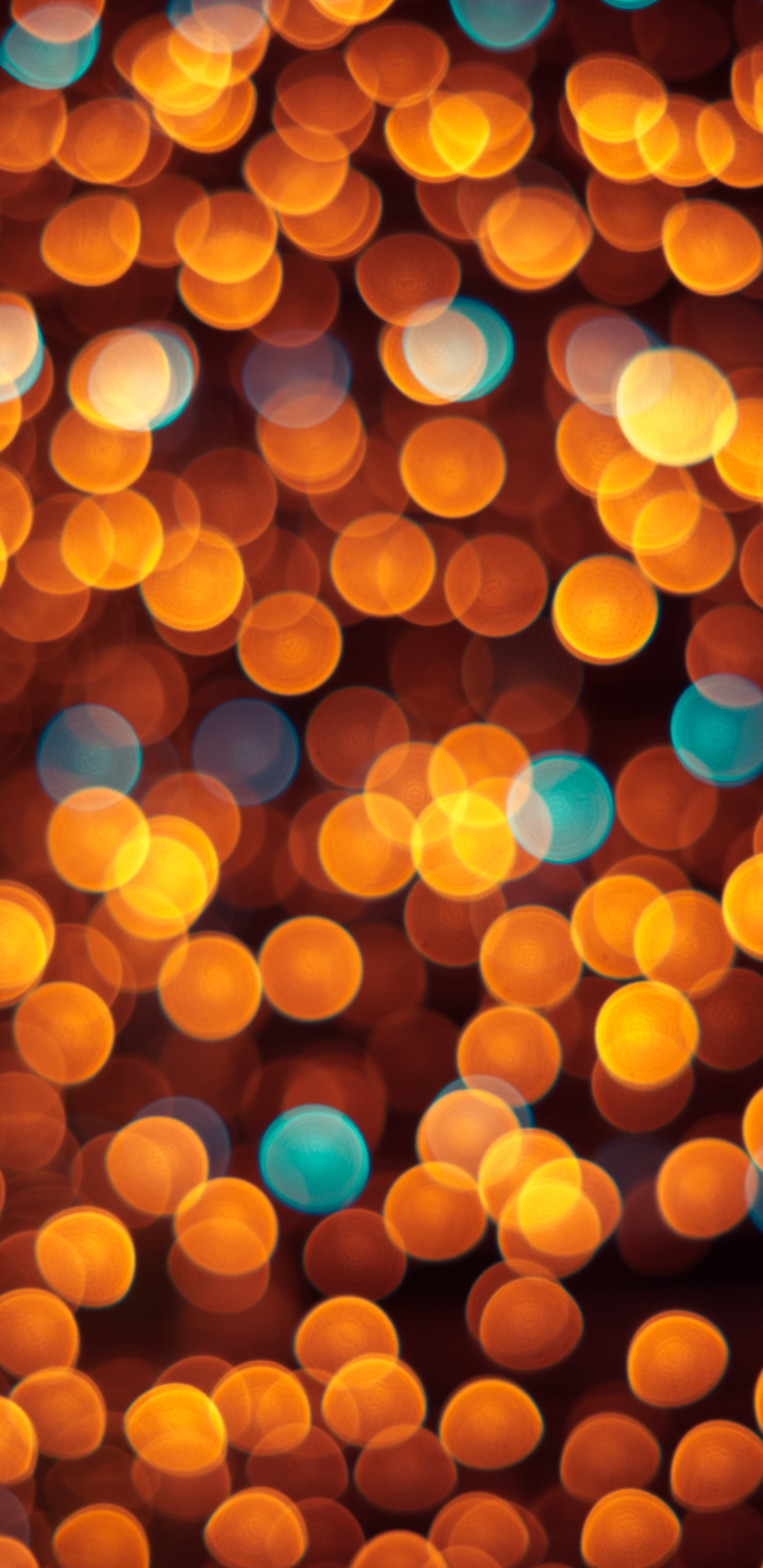 Orangefarbene Bokeh-Lichter Während Der Nacht. Wallpaper in 1440x2960 Resolution