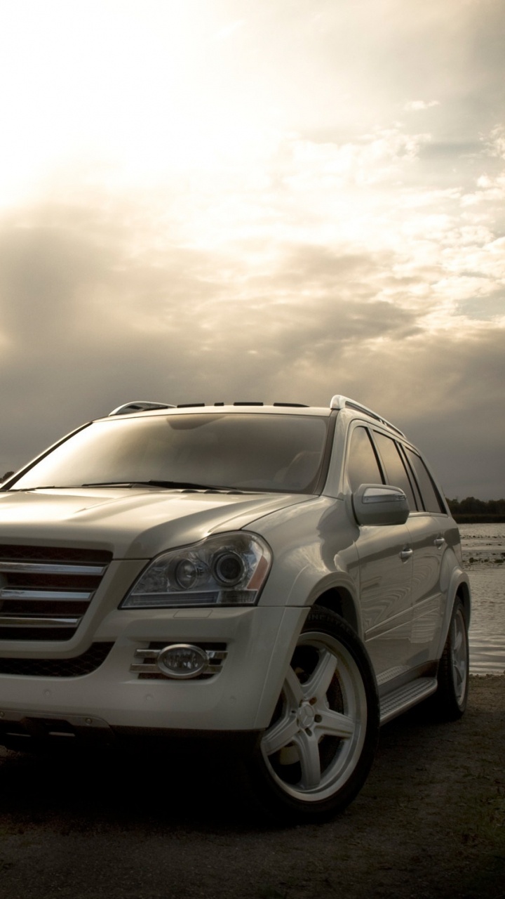 White Mercedes Benz Suv on Road During Daytime. Wallpaper in 720x1280 Resolution
