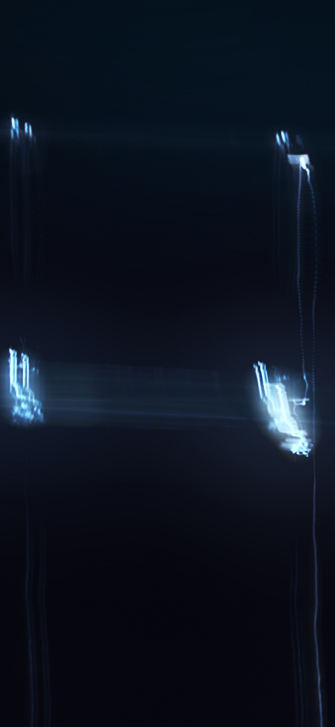 Weiße Glühbirne im Dunklen Raum Eingeschaltet. Wallpaper in 1125x2436 Resolution