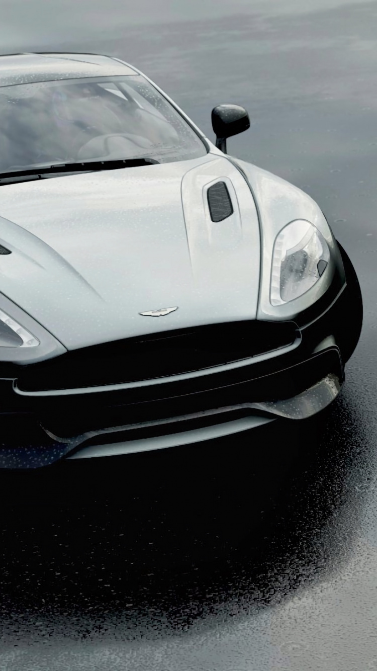 Porsche 911 Blanco Sobre Suelo Cubierto de Nieve. Wallpaper in 750x1334 Resolution