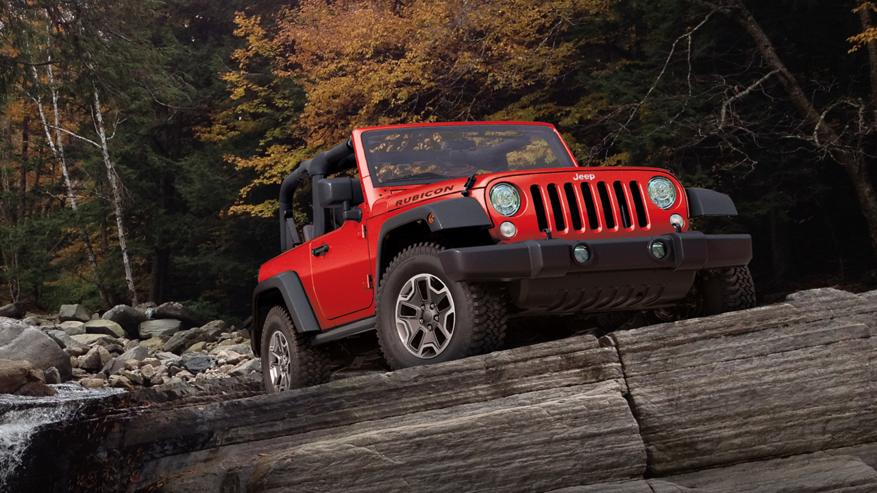 Jeep Wrangler Rouge Sur Chemin de Terre Pendant la Journée. Wallpaper in 1280x720 Resolution