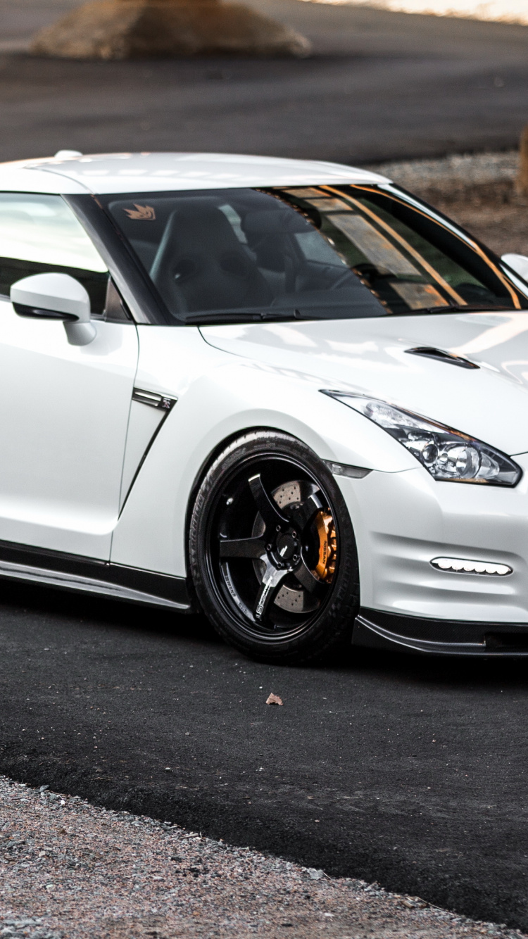 White Porsche 911 on Road During Daytime. Wallpaper in 750x1334 Resolution