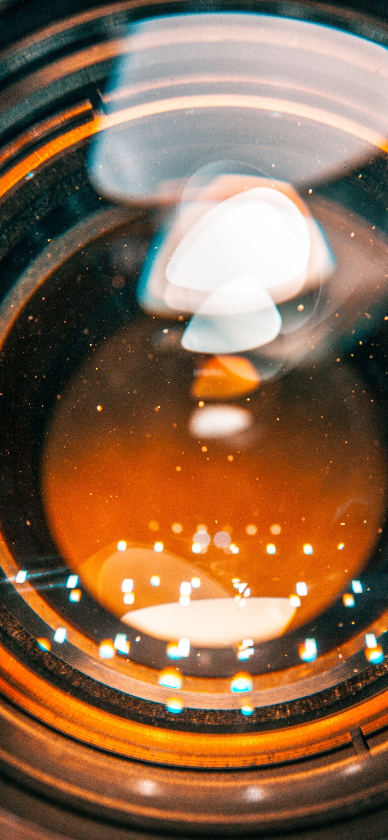 Clear Glass Bottle With Brown Liquid. Wallpaper in 1242x2688 Resolution