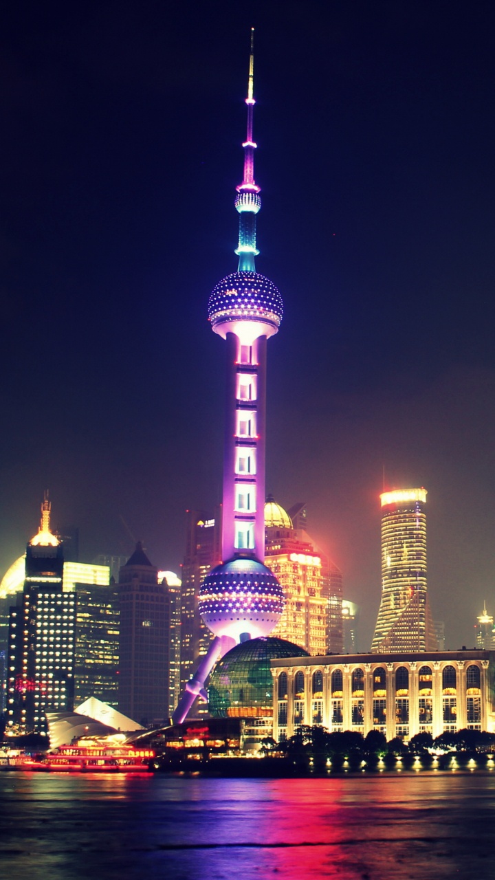 City Skyline During Night Time. Wallpaper in 720x1280 Resolution