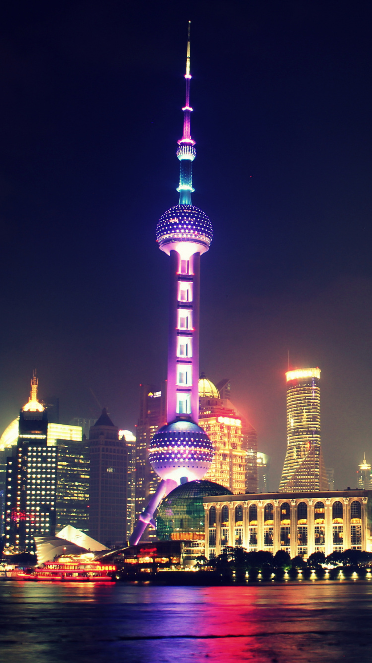 City Skyline During Night Time. Wallpaper in 750x1334 Resolution