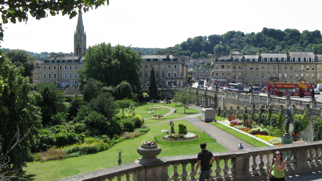 People Walking on Pathway Near Green Grass Field During Daytime. Wallpaper in 1280x720 Resolution