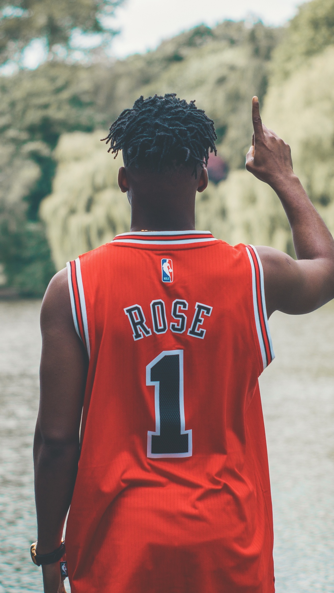 Man in Red and White Jersey Shirt Standing on Water During Daytime. Wallpaper in 1080x1920 Resolution