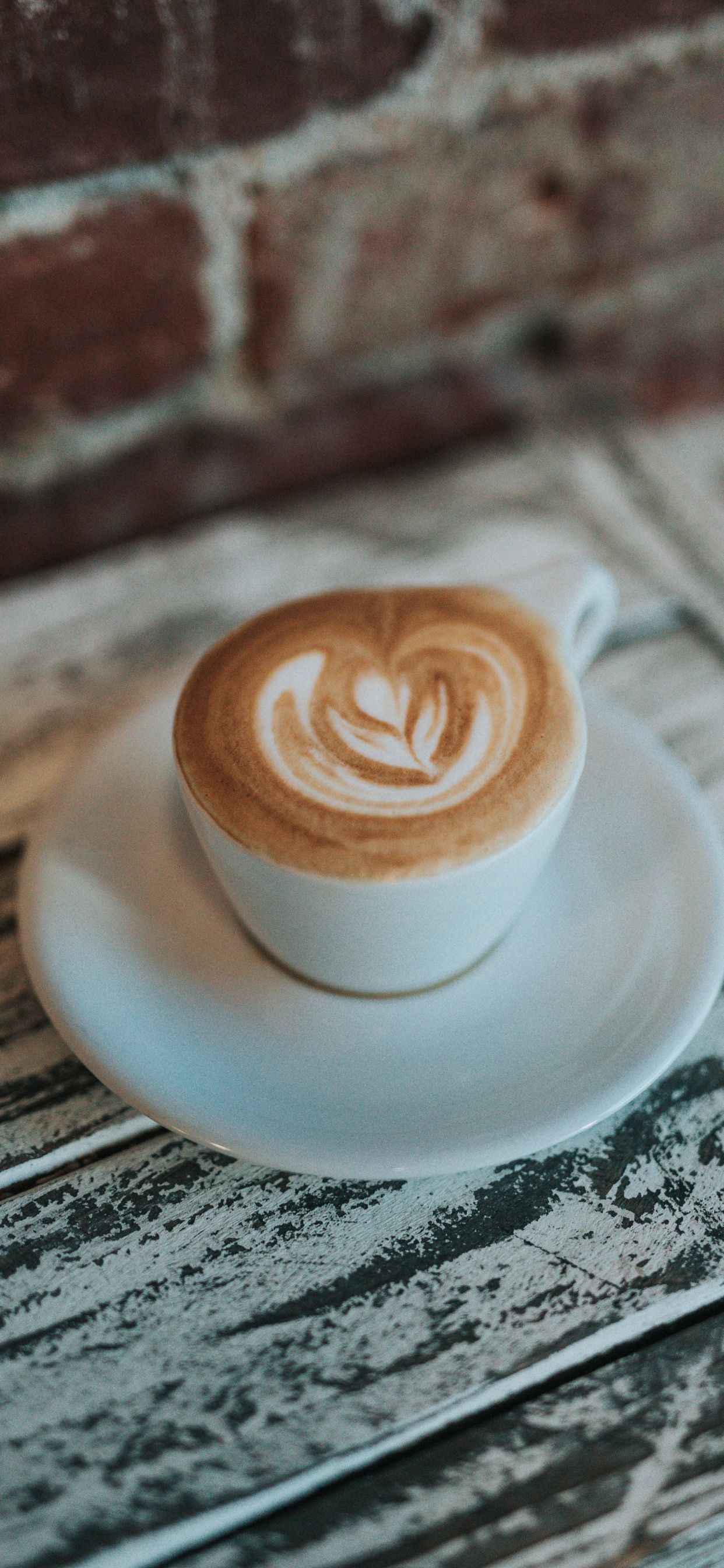 White Ceramic Cup With Saucer on Table. Wallpaper in 1242x2688 Resolution