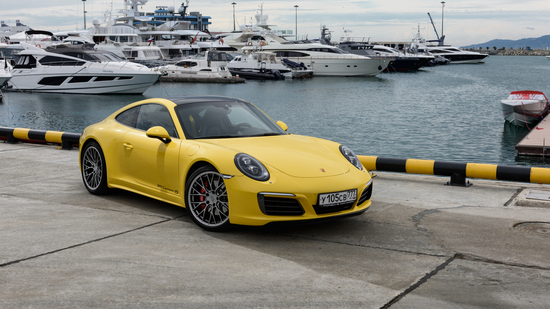 Yellow Ferrari 458 Italia Parked on Gray Concrete Pavement Near Body of Water During Daytime. Wallpaper in 1920x1080 Resolution