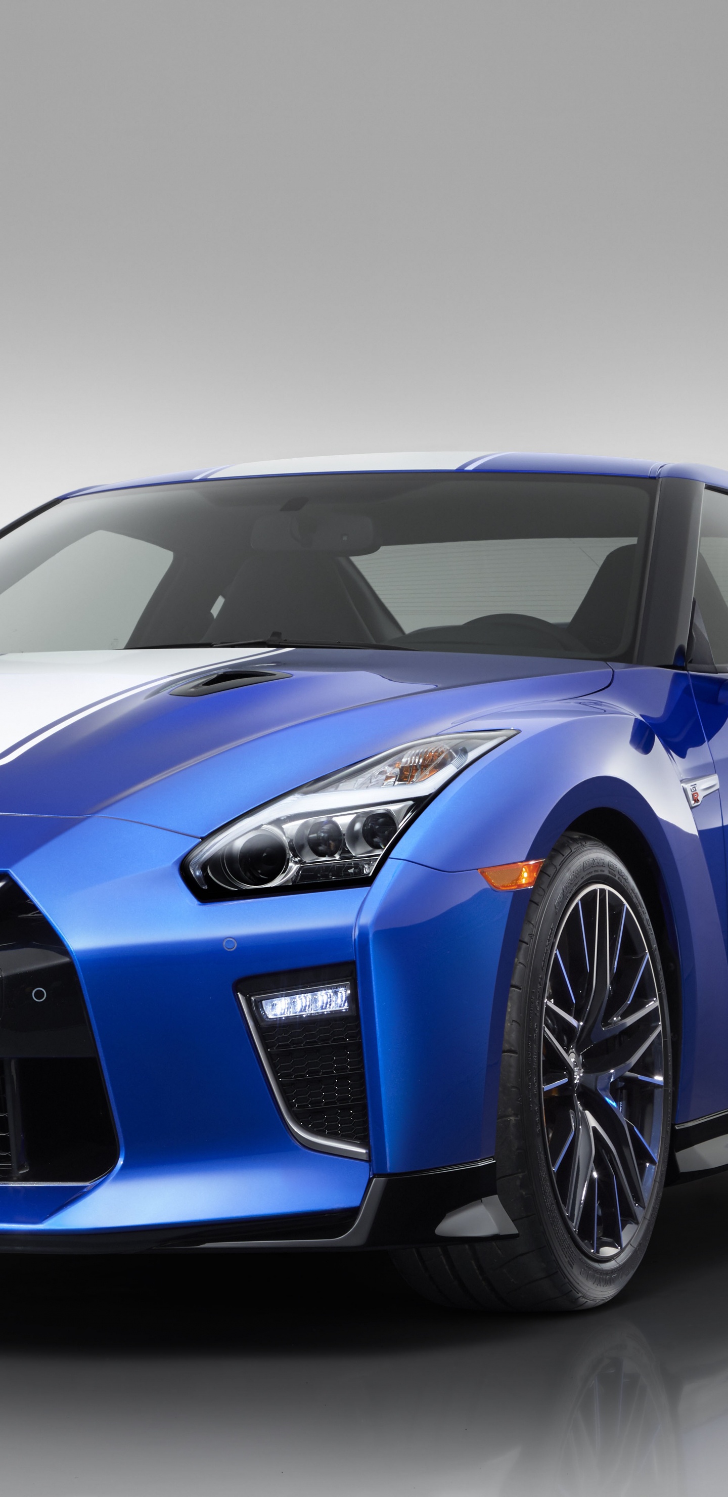 Blue Porsche 911 on White Background. Wallpaper in 1440x2960 Resolution