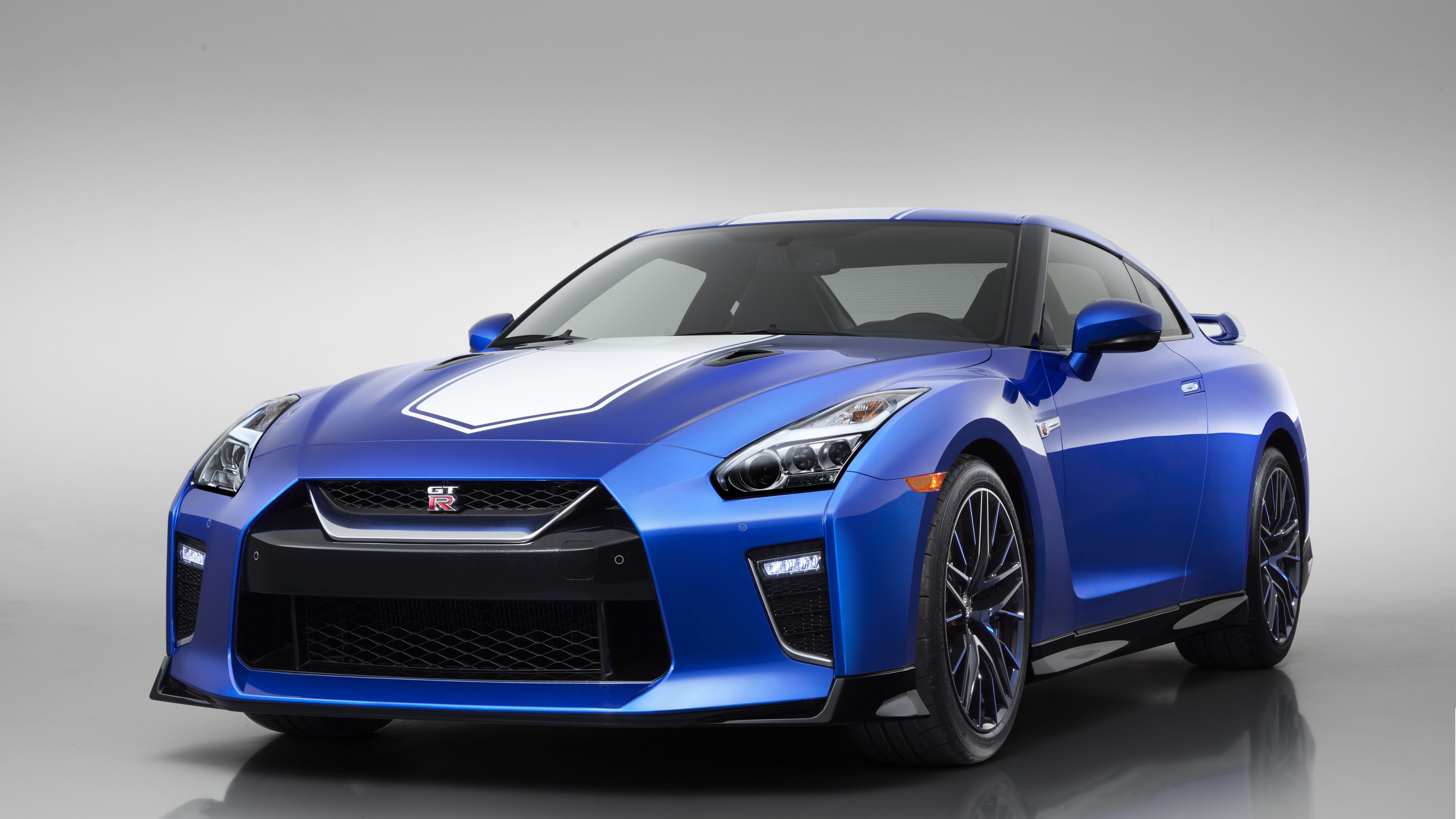 Porsche 911 Bleu Sur Fond Blanc. Wallpaper in 3840x2160 Resolution