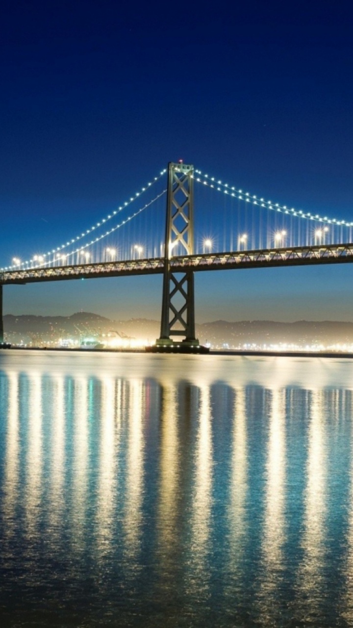 Bridge Over Water Under Blue Sky During Daytime. Wallpaper in 720x1280 Resolution