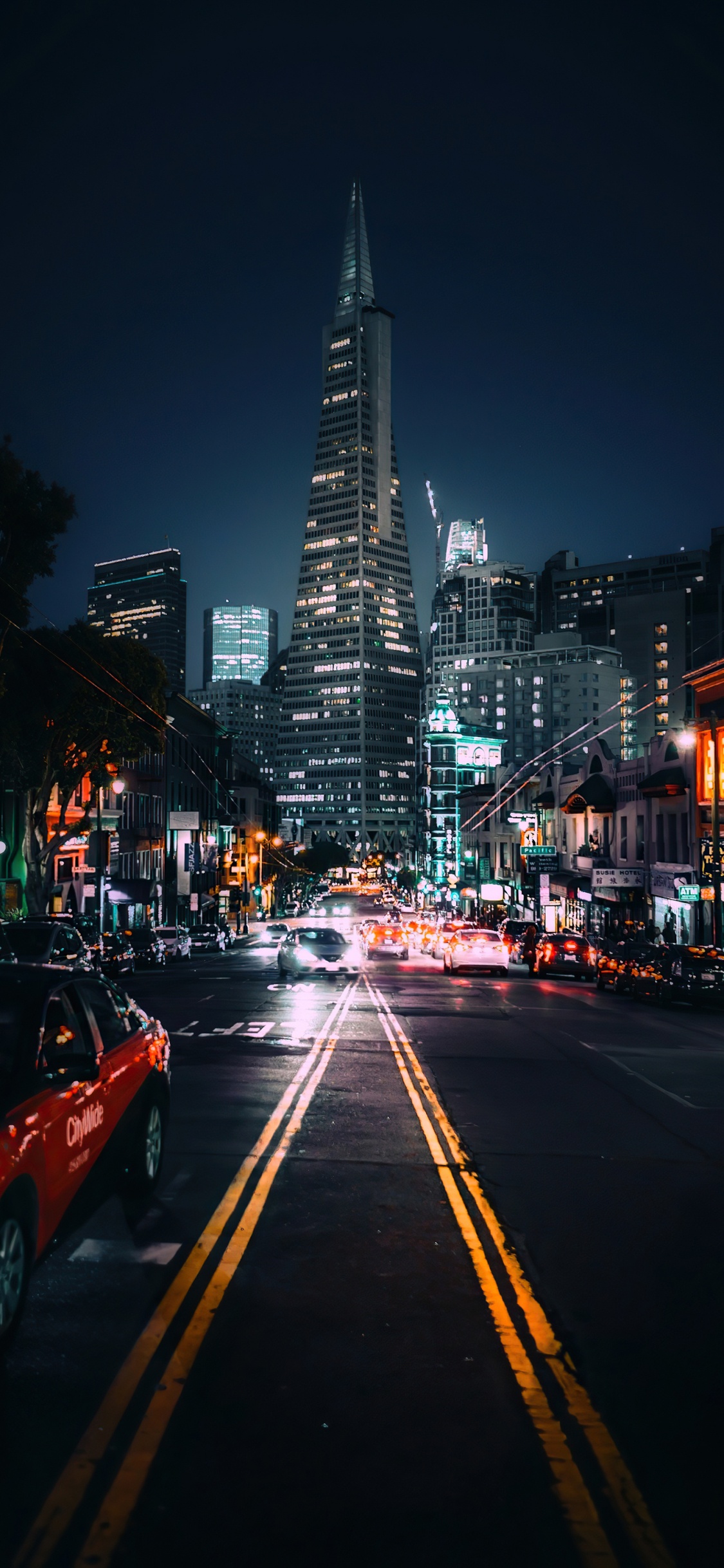 Low Angle City, Building, Cars, Skyscraper, Wheel. Wallpaper in 1125x2436 Resolution