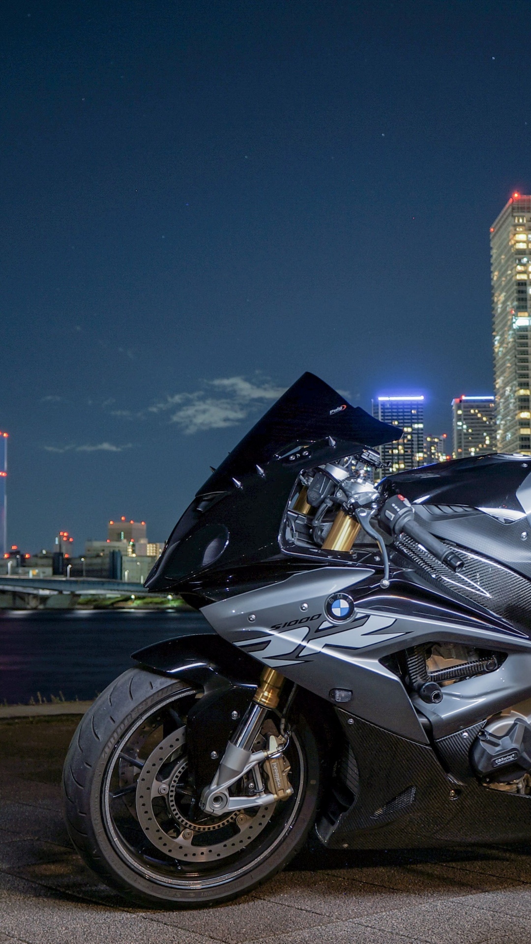 Black Sports Bike on Road During Night Time. Wallpaper in 1080x1920 Resolution