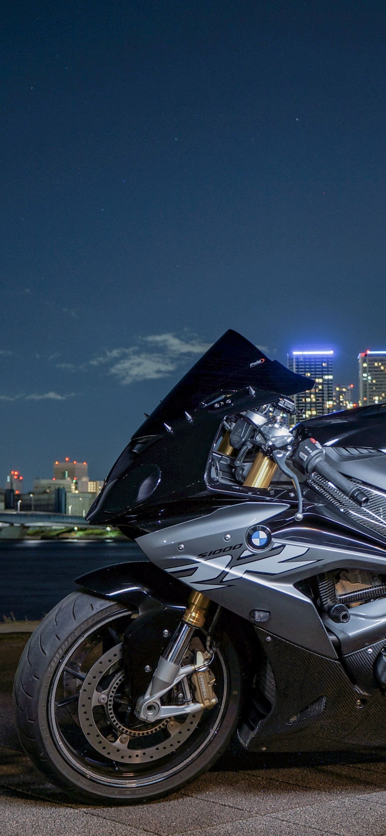 Black Sports Bike on Road During Night Time. Wallpaper in 1242x2688 Resolution