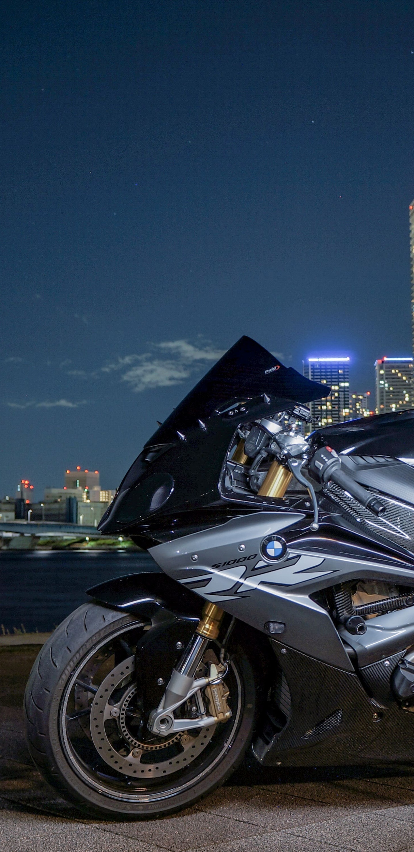 Black Sports Bike on Road During Night Time. Wallpaper in 1440x2960 Resolution