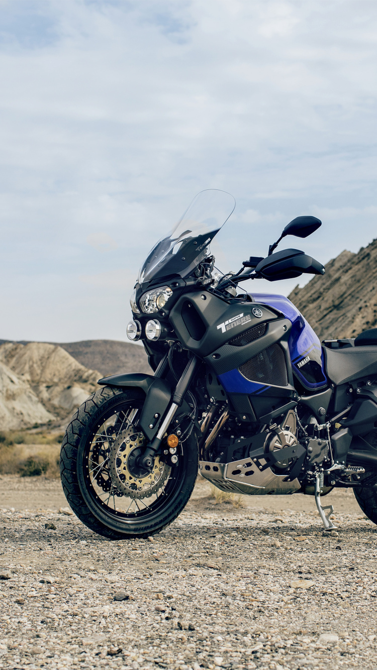 Black Motorcycle on Brown Field During Daytime. Wallpaper in 750x1334 Resolution