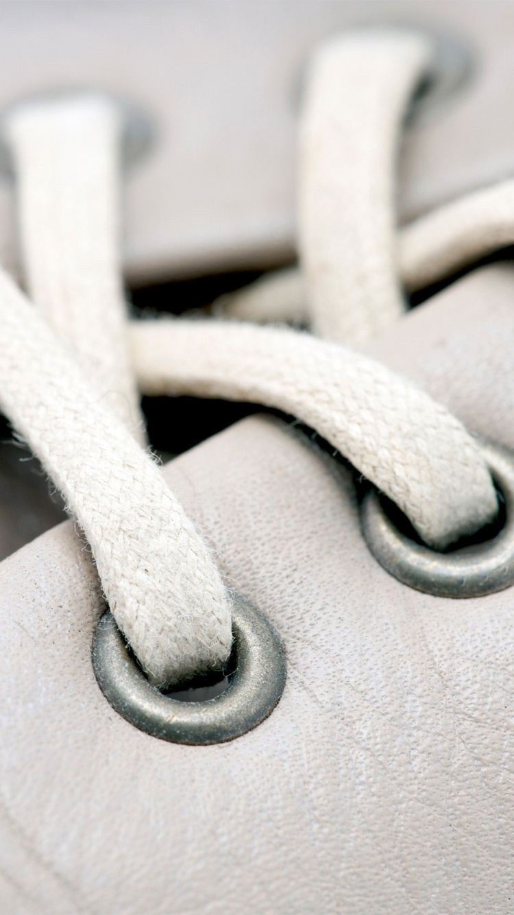 Textil de Cuero Blanco Con Encaje Blanco. Wallpaper in 750x1334 Resolution