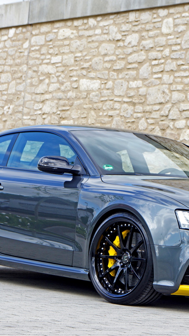 Schwarzes Bmw m 3 Coupe Neben Brauner Mauer Geparkt. Wallpaper in 720x1280 Resolution