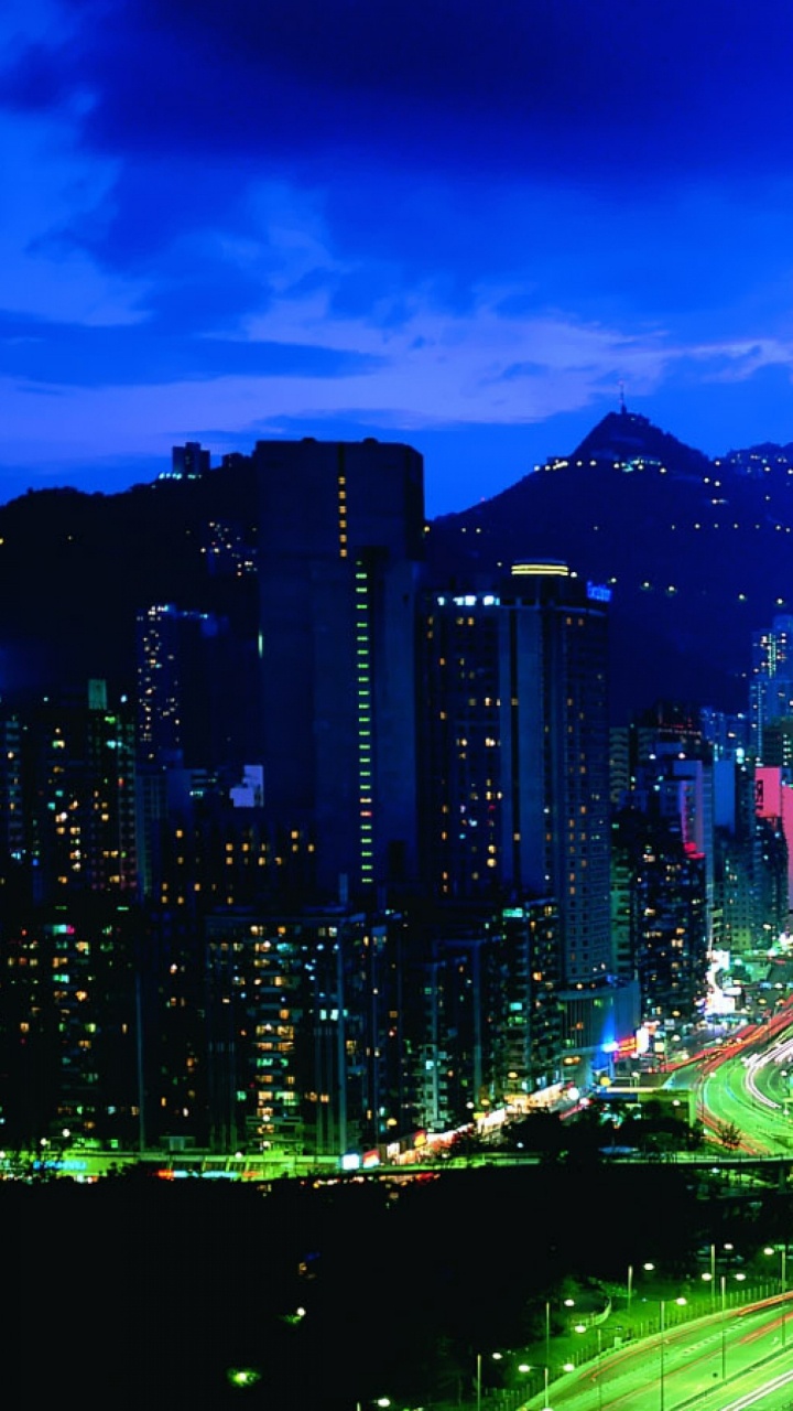 City Skyline During Night Time. Wallpaper in 720x1280 Resolution