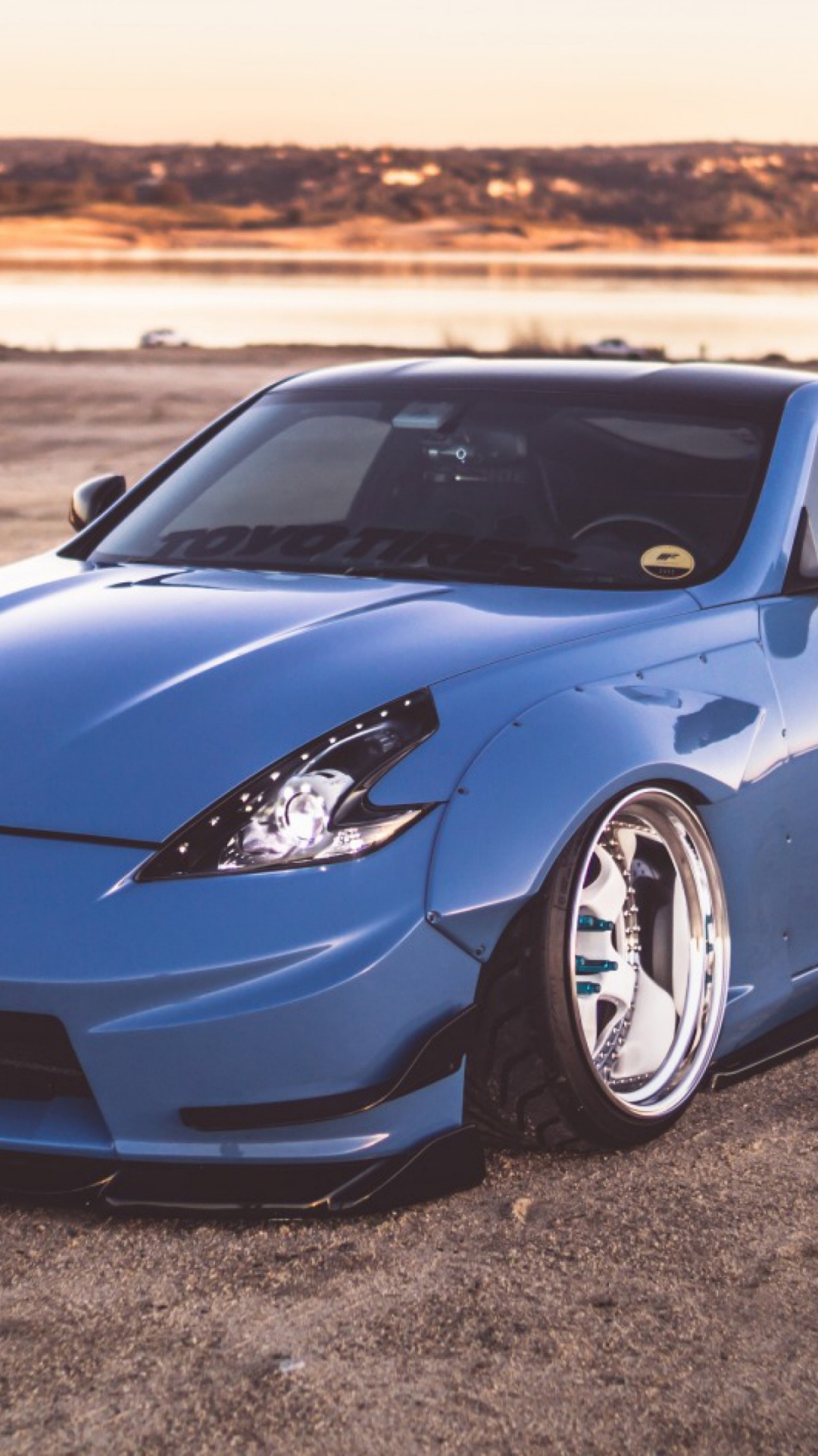 Blue Porsche 911 on Brown Sand During Daytime. Wallpaper in 1080x1920 Resolution