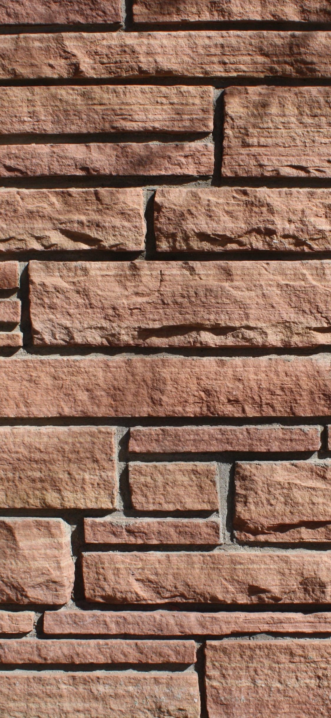 Brown and White Brick Wall. Wallpaper in 1125x2436 Resolution