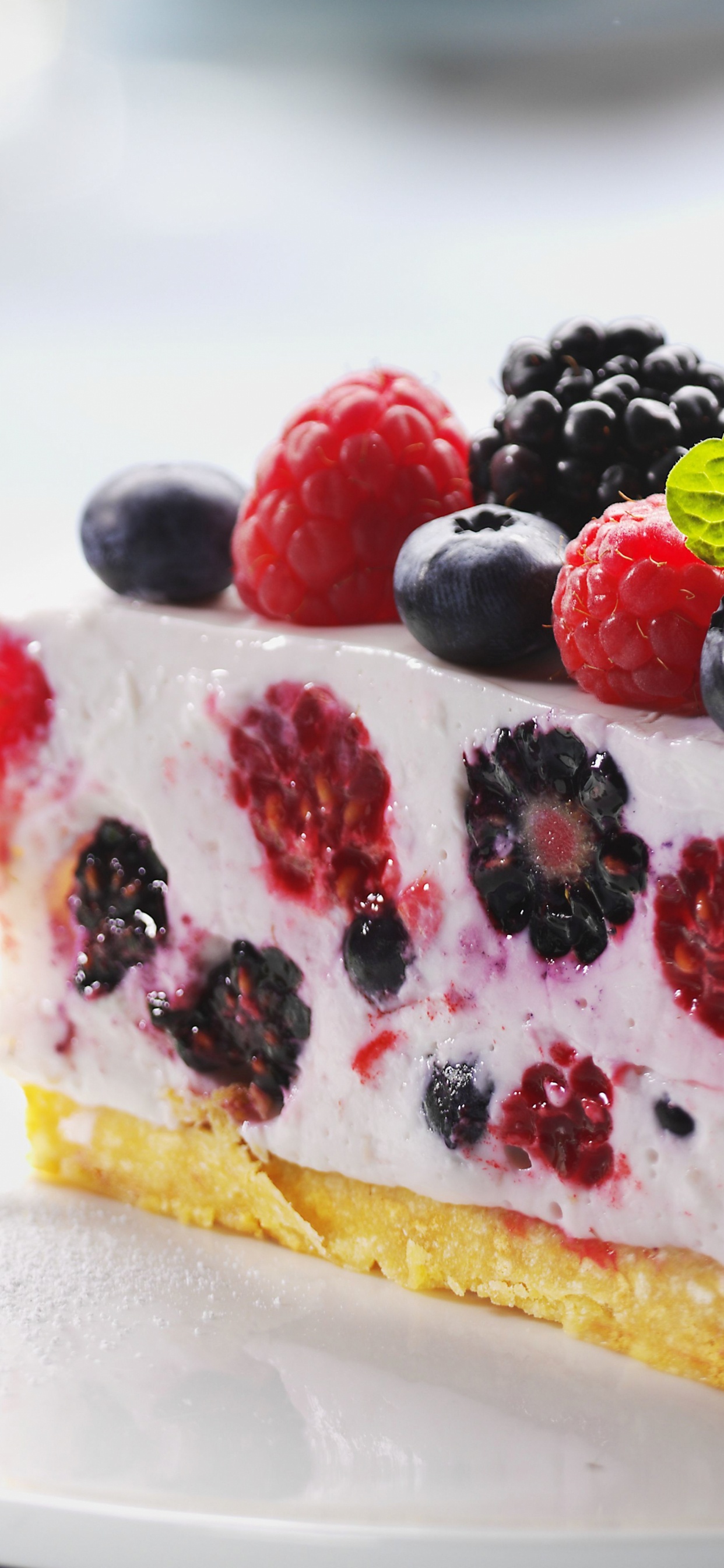 White and Red Cake With Raspberry on Top. Wallpaper in 1242x2688 Resolution