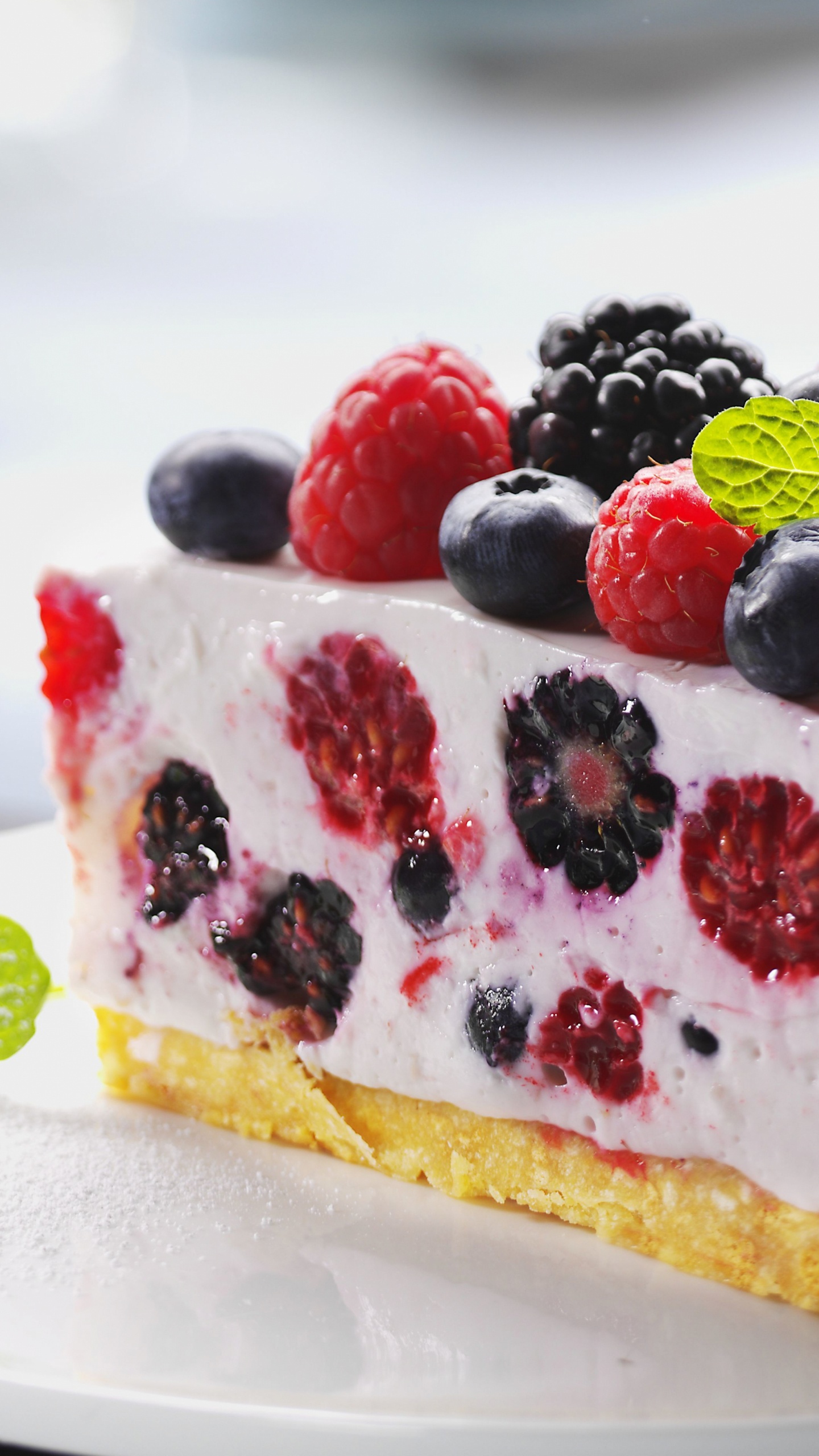 White and Red Cake With Raspberry on Top. Wallpaper in 1440x2560 Resolution