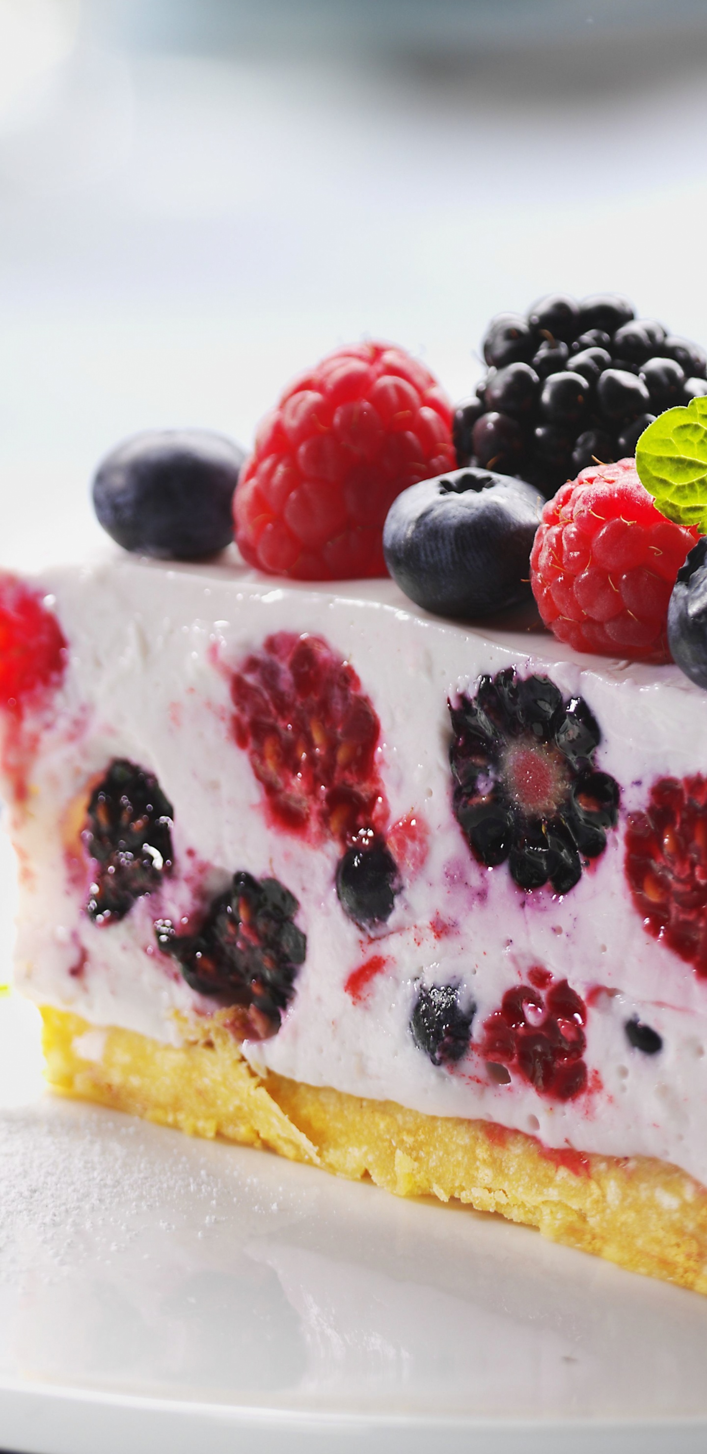 White and Red Cake With Raspberry on Top. Wallpaper in 1440x2960 Resolution