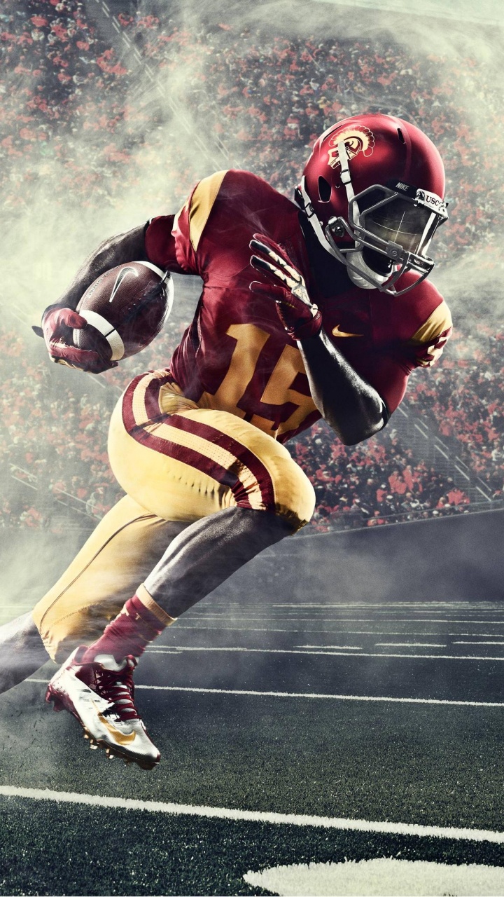 Homme en Maillot Rouge et Blanc et Short Jouant au Football. Wallpaper in 720x1280 Resolution