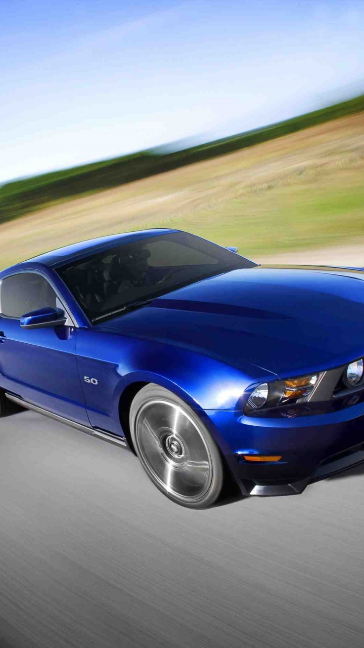 Porsche 911 Azul en la Carretera Durante el Día. Wallpaper in 720x1280 Resolution