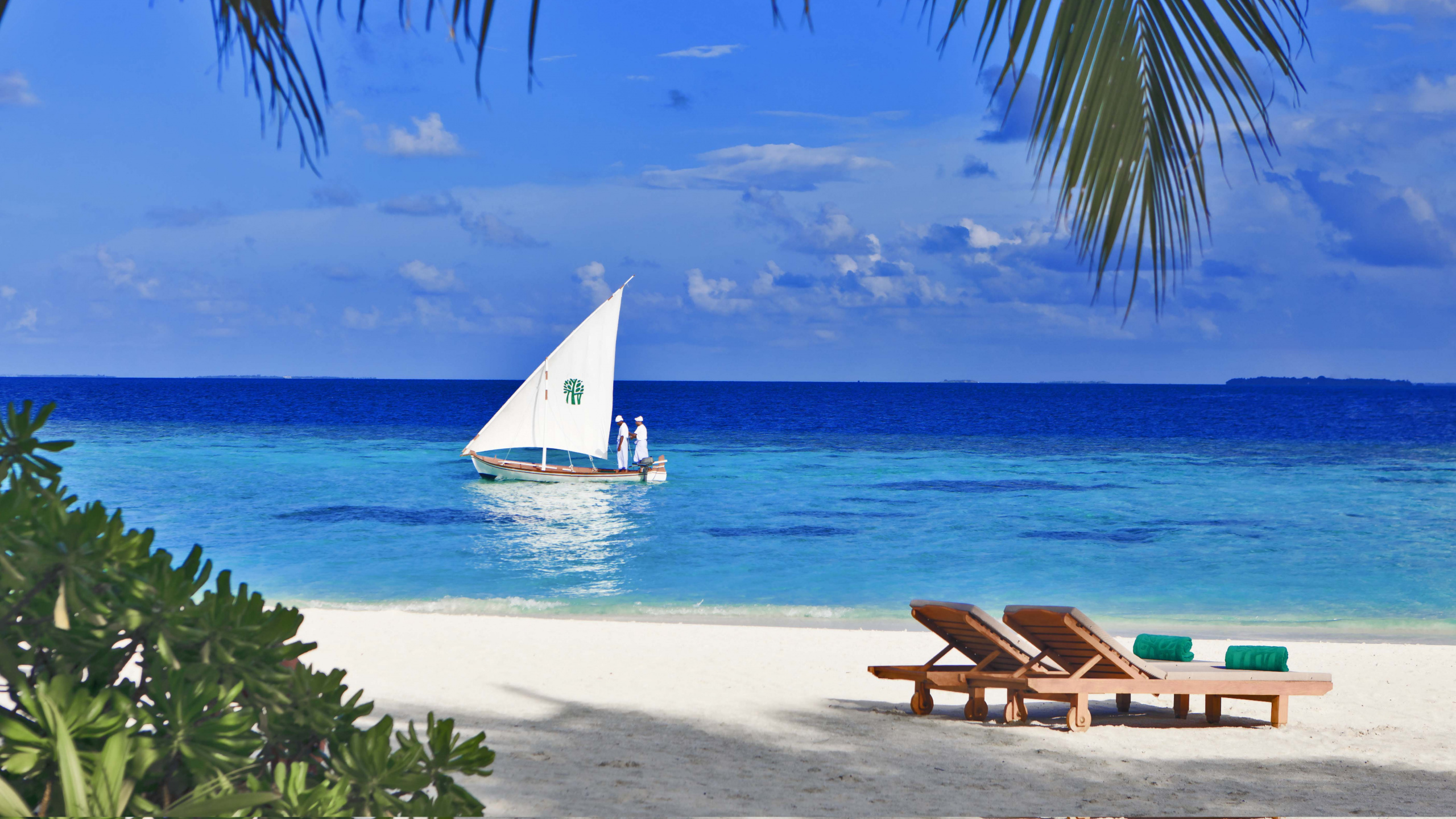 White Sailboat on Sea Shore During Daytime. Wallpaper in 2560x1440 Resolution