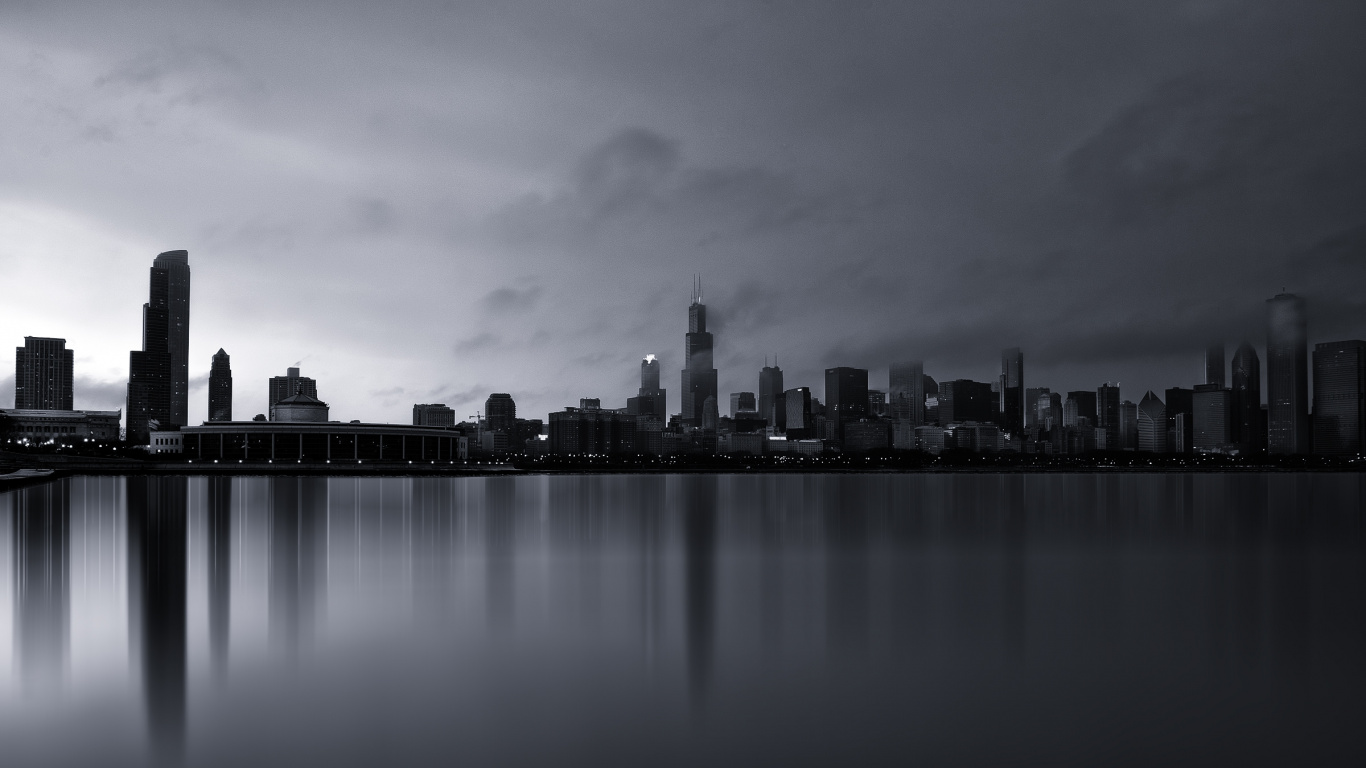 City Skyline Across Body of Water During Night Time. Wallpaper in 1366x768 Resolution