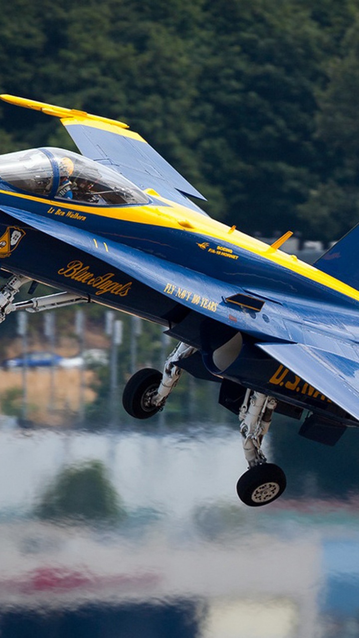 Blue and Yellow Jet Plane on Air During Daytime. Wallpaper in 720x1280 Resolution