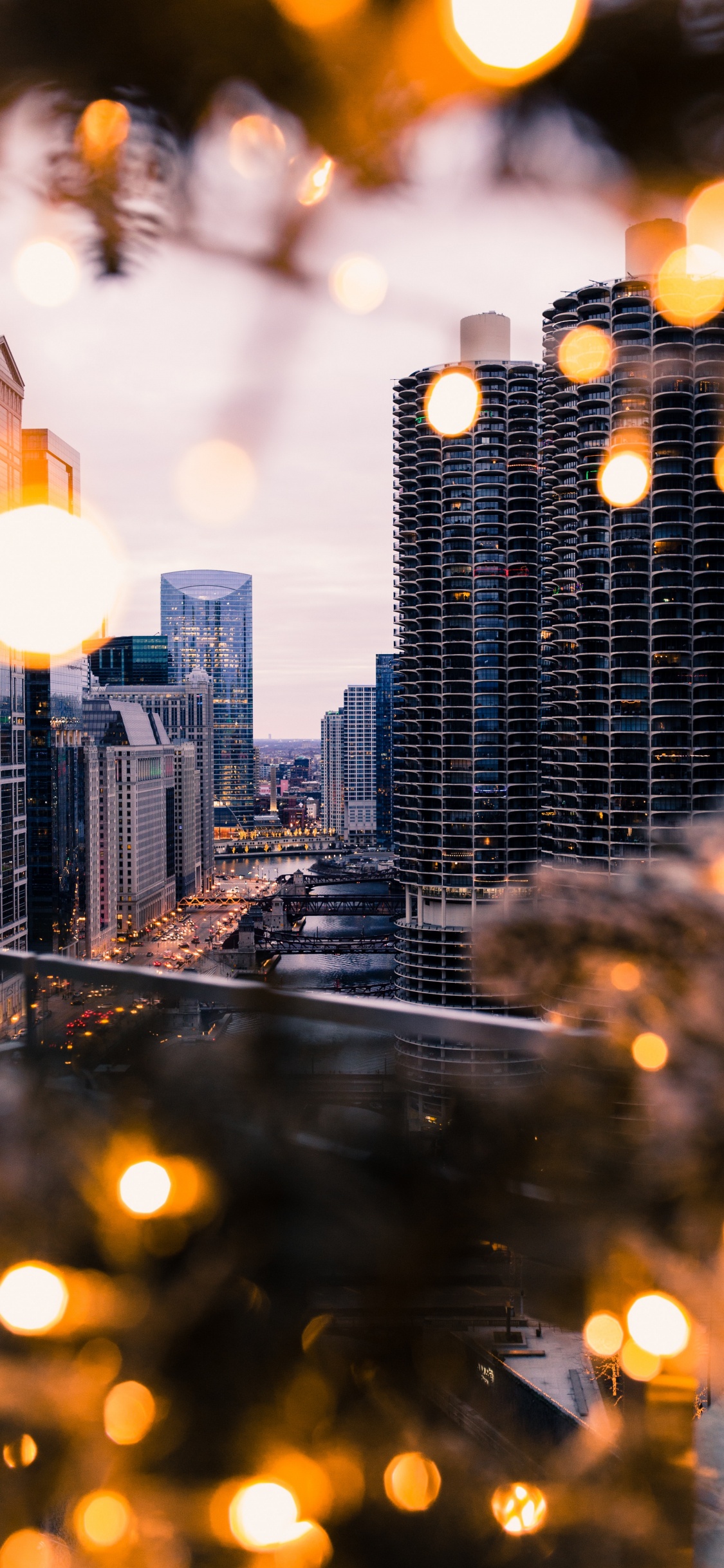 City Buildings During Night Time. Wallpaper in 1125x2436 Resolution