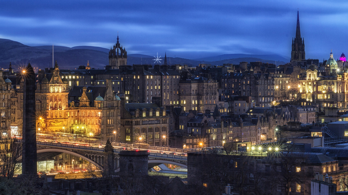 Bâtiment en Béton Brun Pendant la Nuit. Wallpaper in 1366x768 Resolution