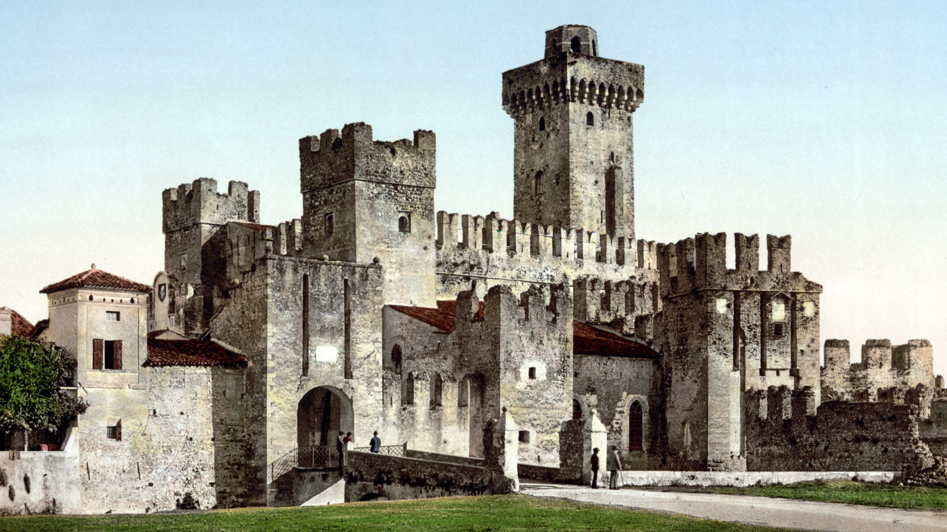 Gray Concrete Castle on Green Grass Field. Wallpaper in 1366x768 Resolution