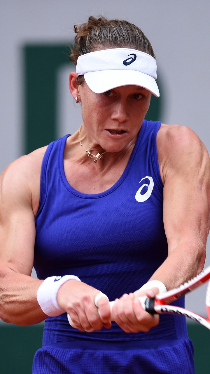 Man in Blue Nike Tank Top Holding Tennis Racket. Wallpaper in 720x1280 Resolution