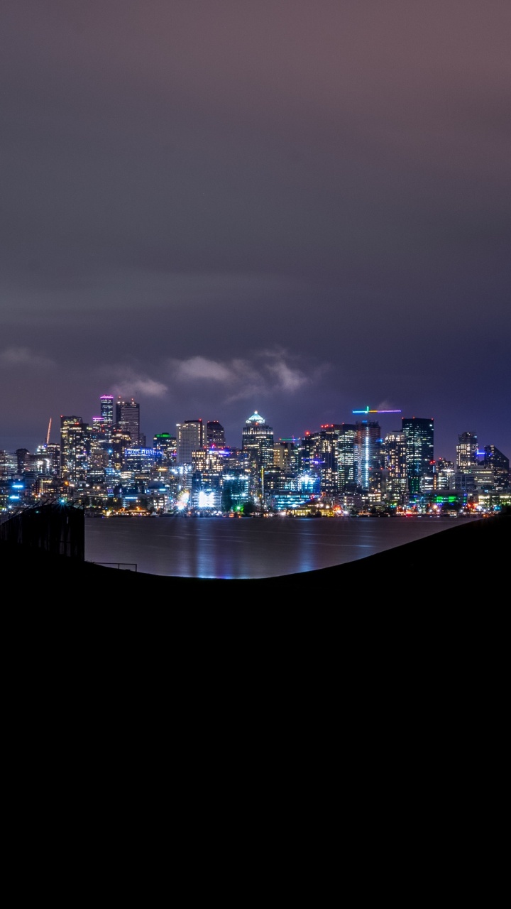 City Skyline During Night Time. Wallpaper in 720x1280 Resolution