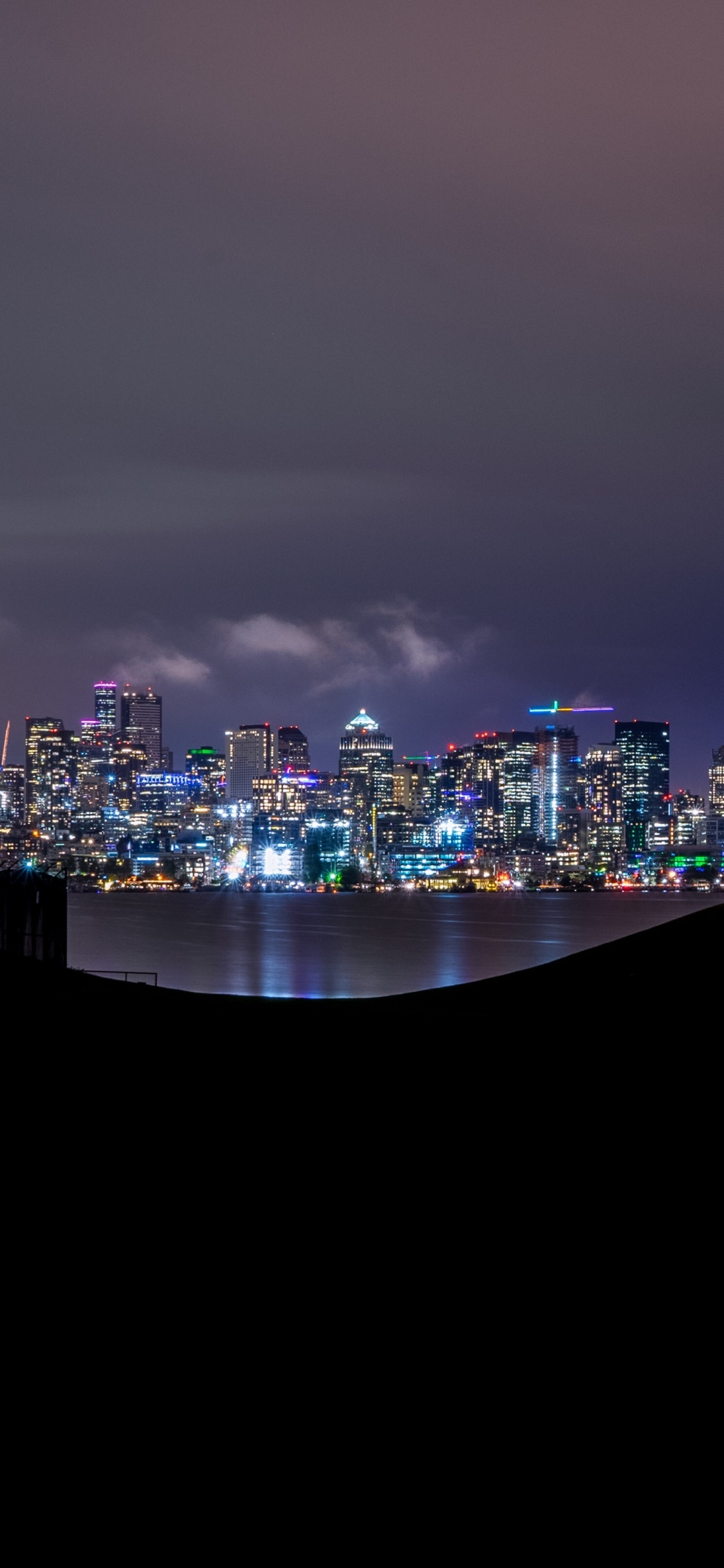 Skyline Der Stadt Bei Nacht Night. Wallpaper in 1125x2436 Resolution