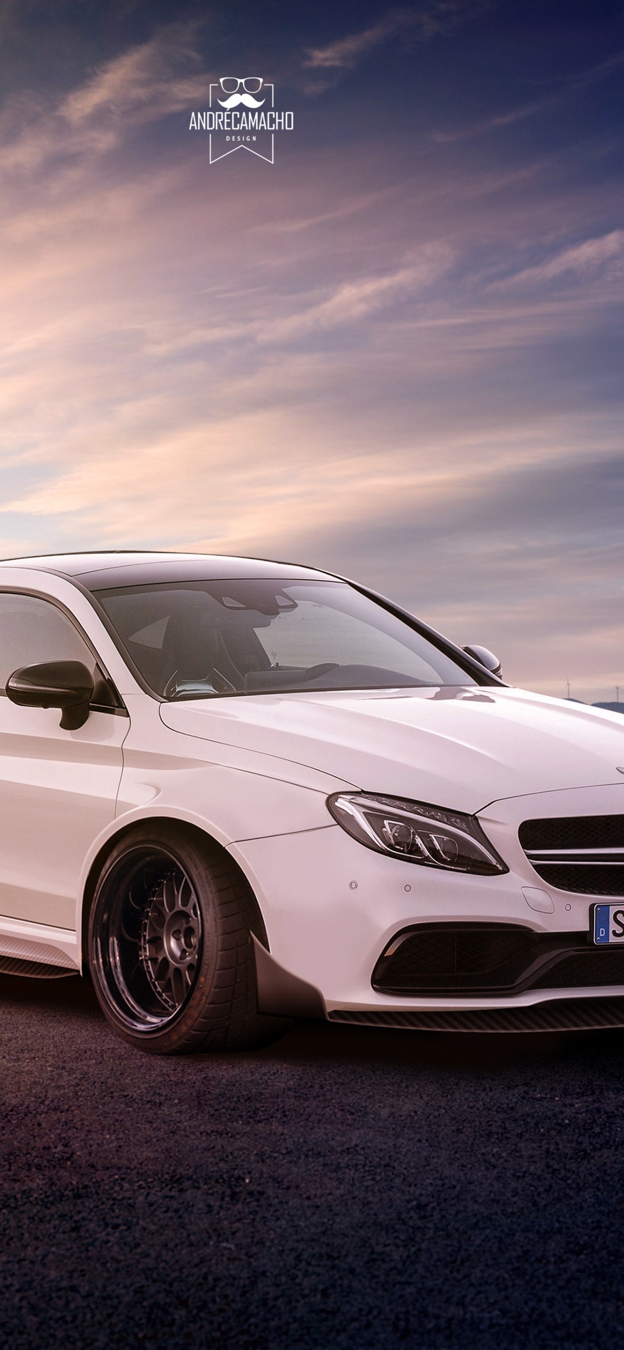 White Mercedes Benz c Class on Gray Sand During Daytime. Wallpaper in 1242x2688 Resolution
