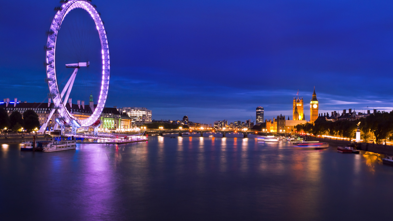 Ferris Wheel Near City Buildings During Night Time. Wallpaper in 1366x768 Resolution