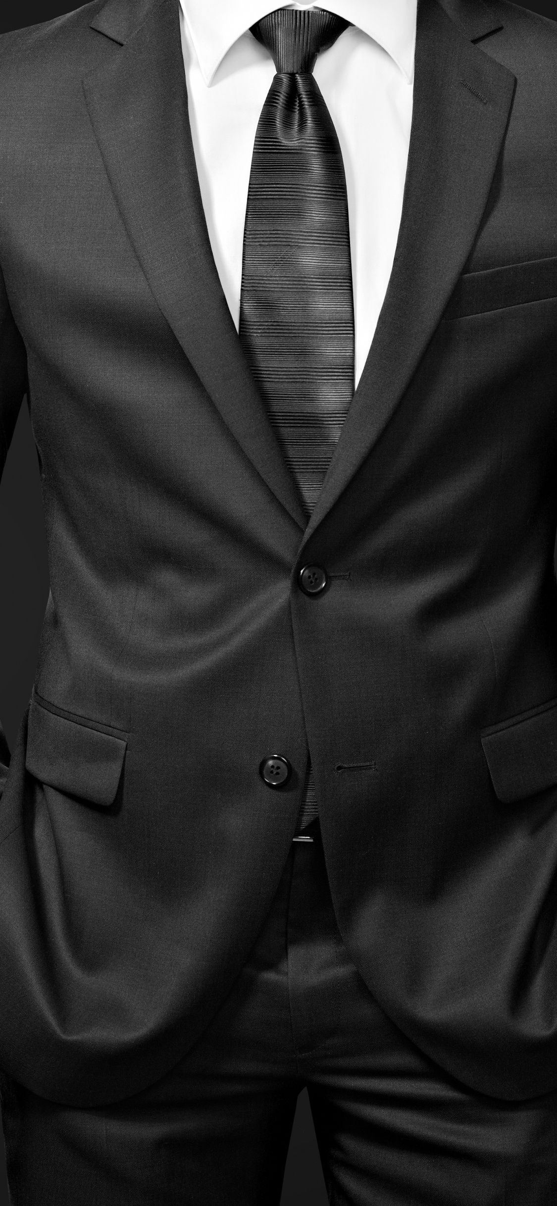 Hombre Con Chaqueta de Traje Negro. Wallpaper in 1125x2436 Resolution