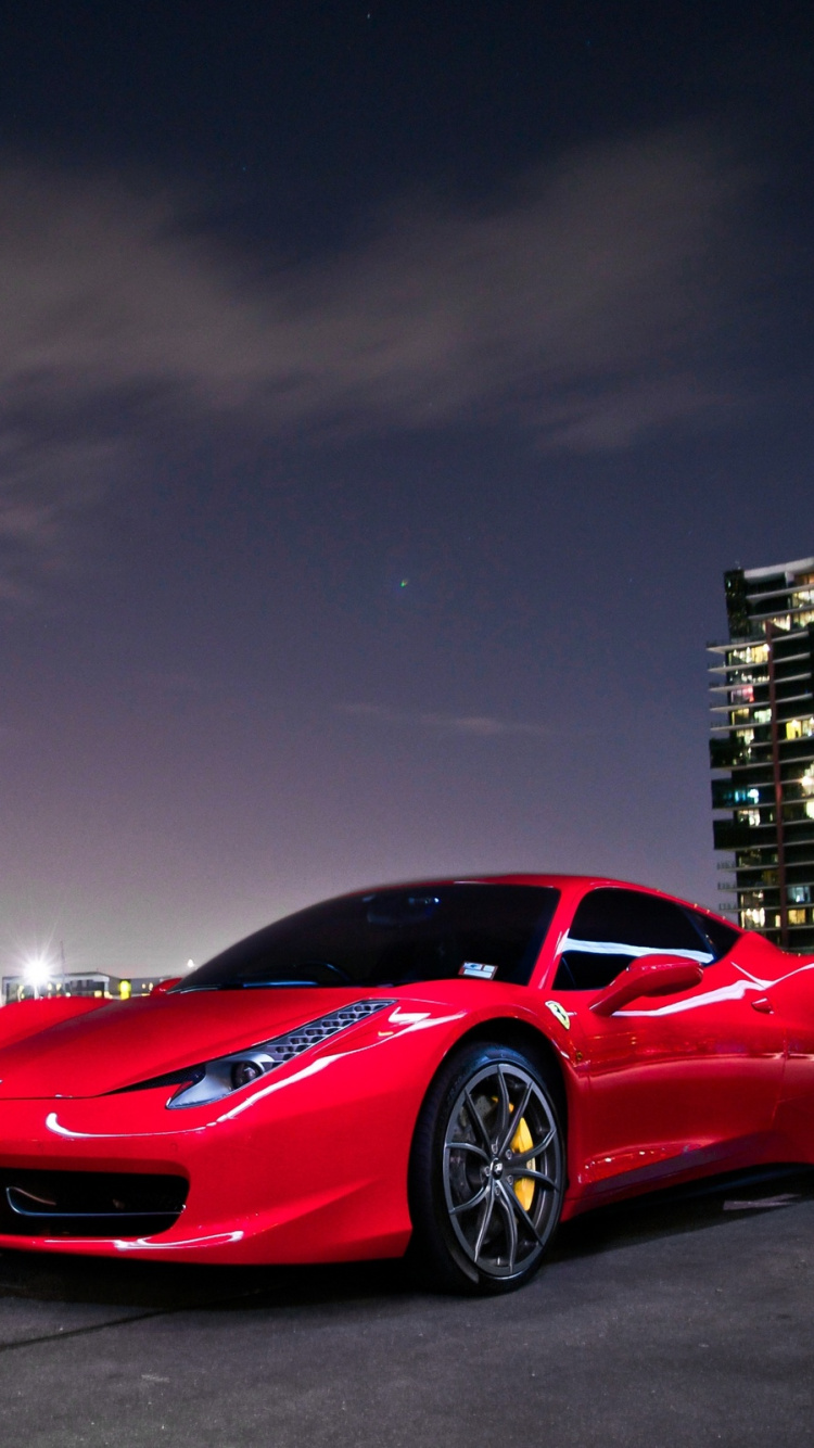Ferrari 458 Italia Rojo en la Carretera Cerca Del Cuerpo de Agua Durante el Día. Wallpaper in 750x1334 Resolution