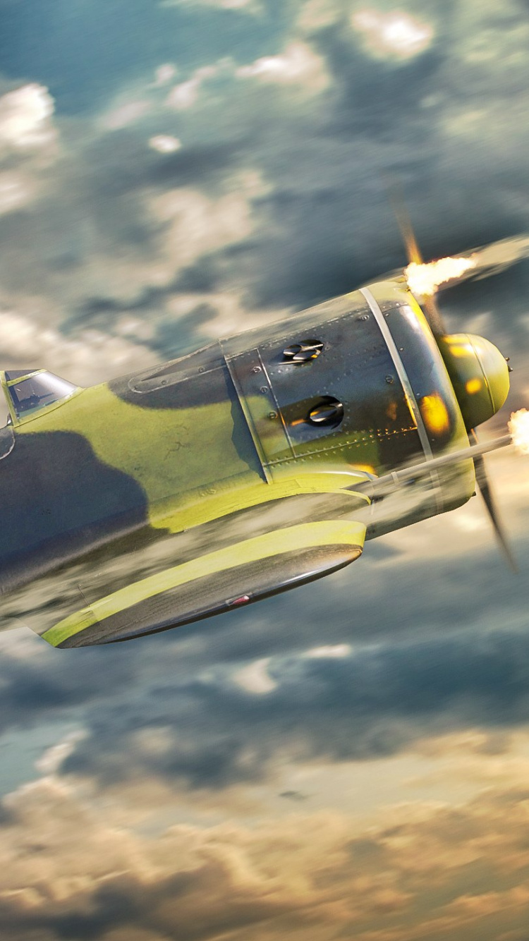 Avión de Combate Verde y Negro Volando Bajo un Cielo Azul Durante el Día. Wallpaper in 750x1334 Resolution