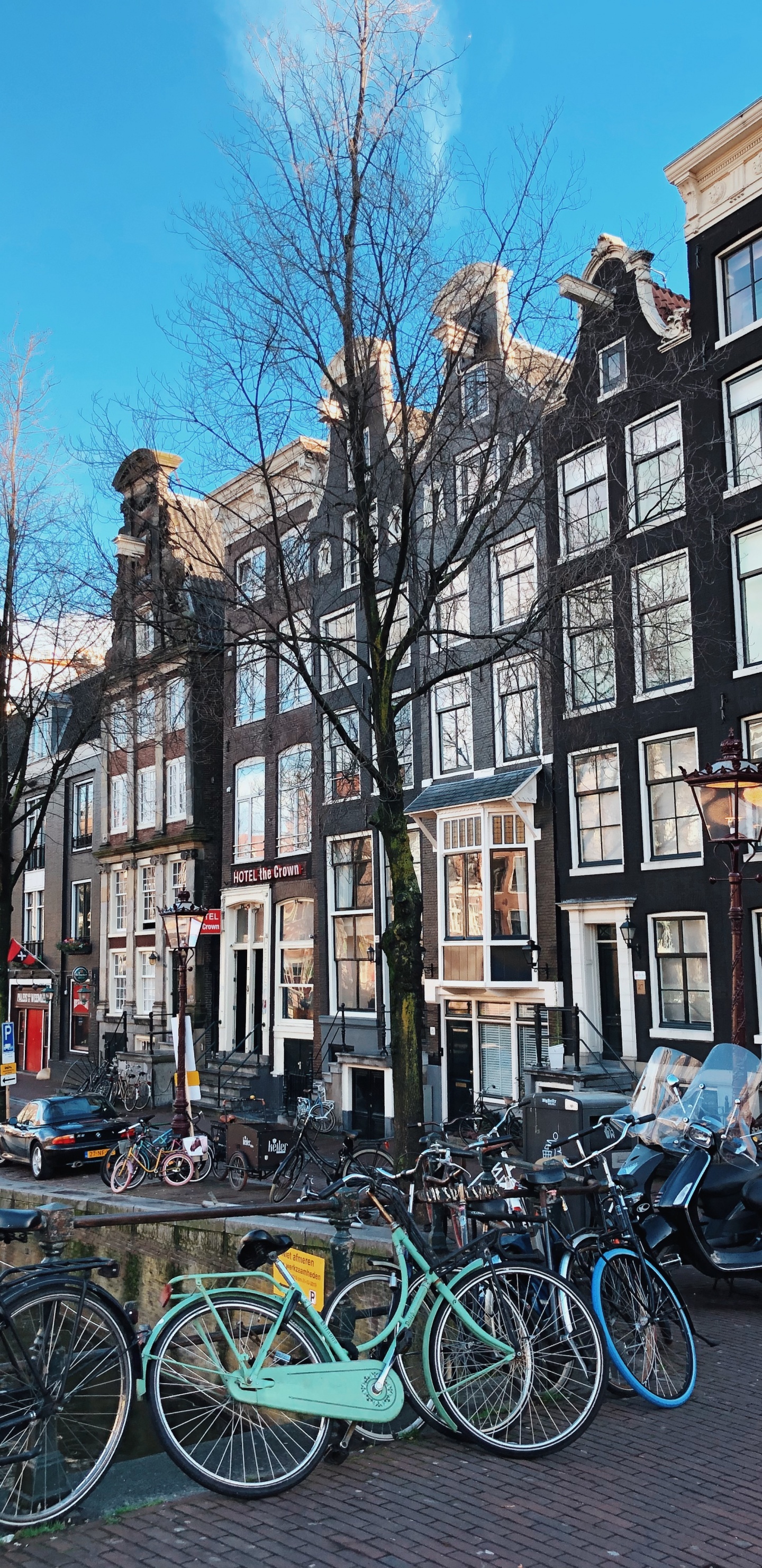 Bicycles Parked in Front of Building During Daytime. Wallpaper in 1440x2960 Resolution